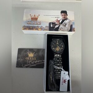 Amazon OLEVS Black and Gold Men's Watch